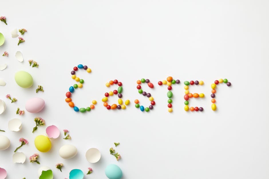 Vibrant Easter-themed flat lay with candies spelling "Easter" and colorful eggshells.