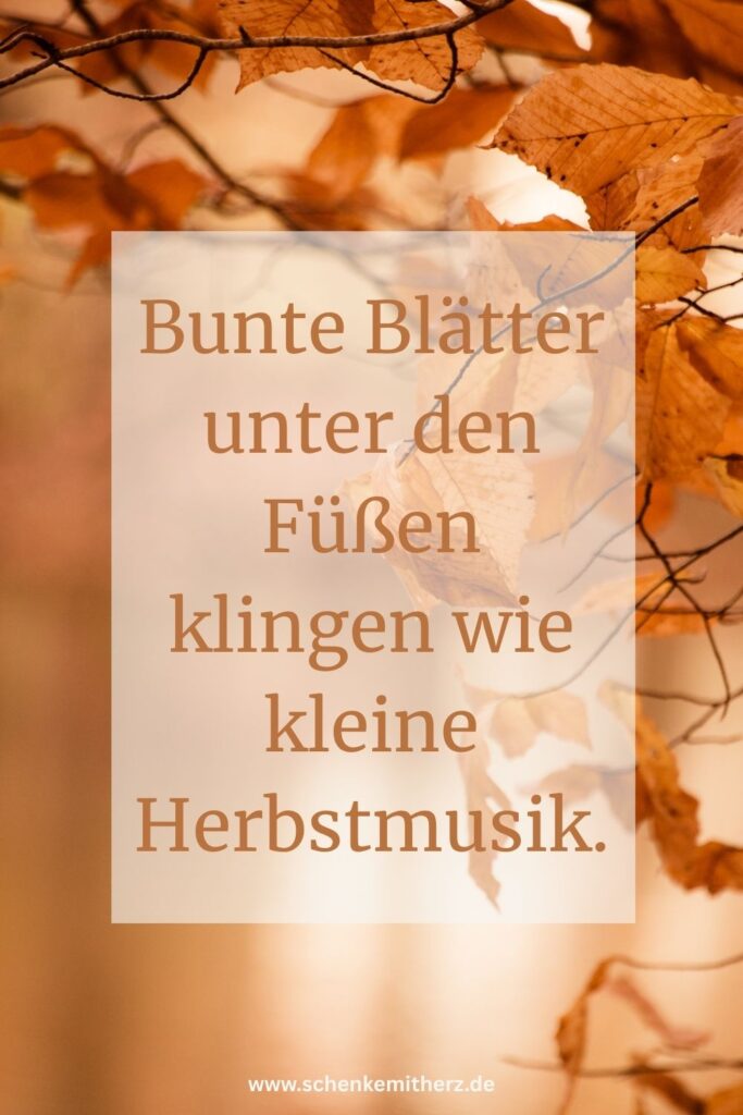 Bunter Herbstbäume mit deem Spruch " Bunte Blätter unter den Füßen klingen wie kleine Herbstmusik."